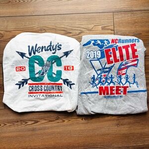 Lot of 2 cross country shirts